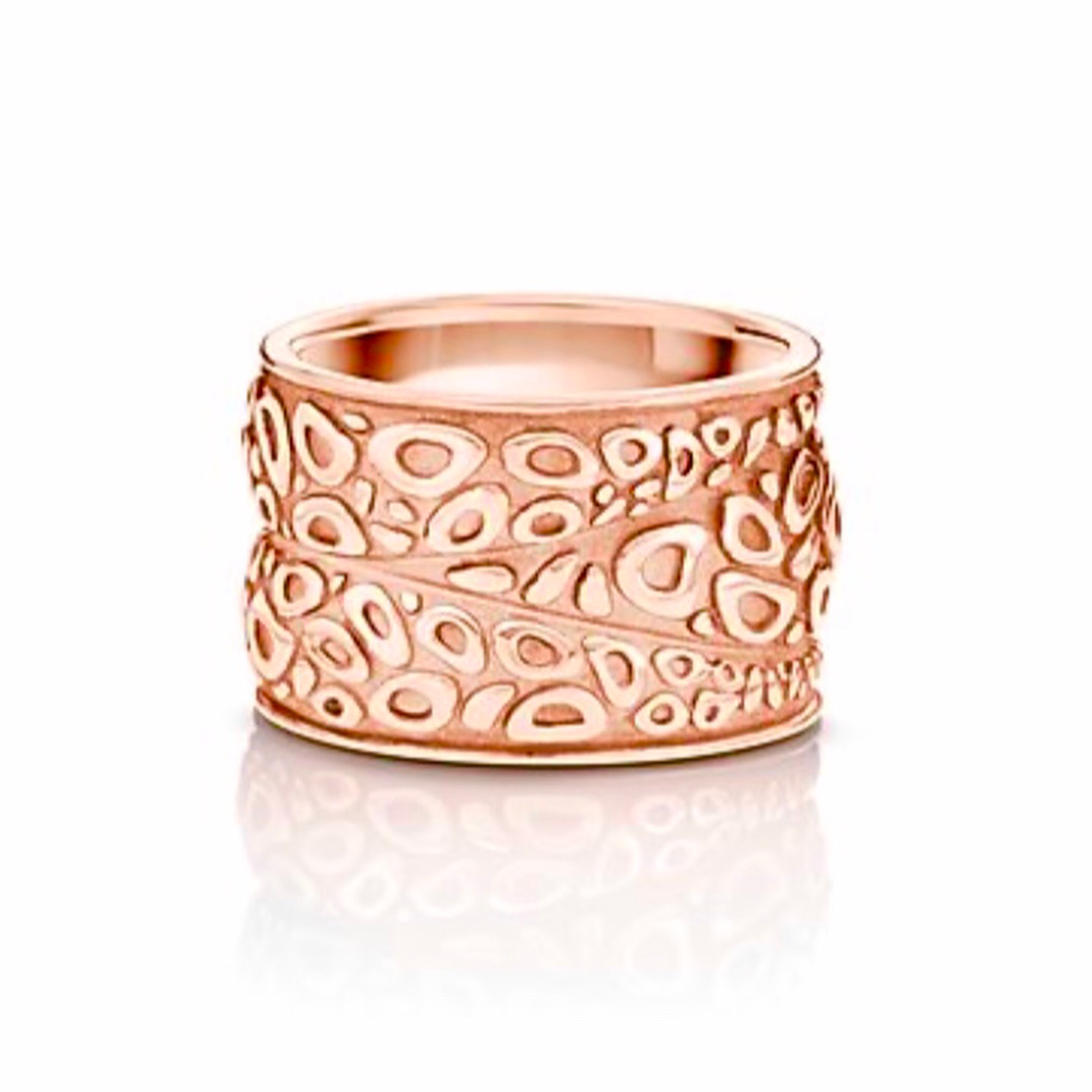 Wide rose-gold ring with cellular pattern