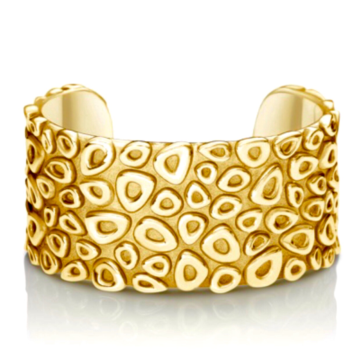 Yellow-gold cuff with cellular pattern